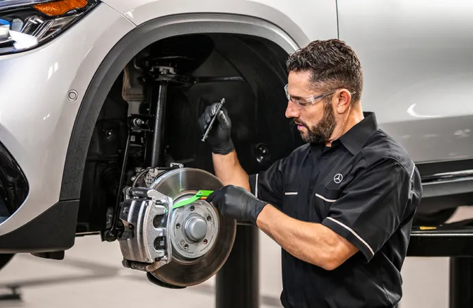 technician working on mercedes brakes Farmington