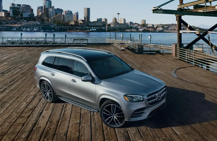 Mercedes-Benz sedan overlooking city